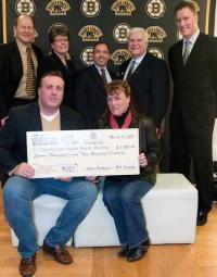 Matt Sweeney, who has served as president of the Dorchester Youth Hockey program for the last three years, and his wife Jill accepted a grant from the Mike Cheever Grow Hockey Development program on March 10 at TD Garden. Also on hand to present the awards were co-chairs Jim Maimone,  Ellie Cheever, Tom Songin,  Steve Palmacci, and Bob Sweeney.